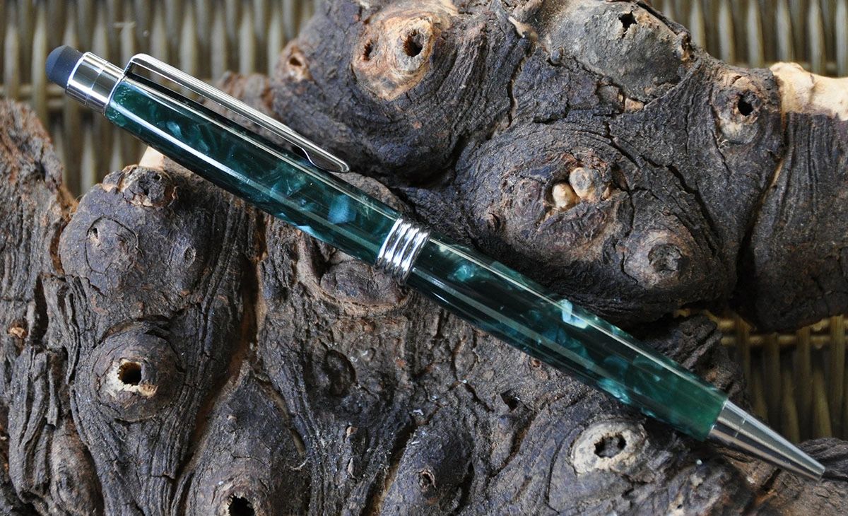 Elegant pen resting on textured wood