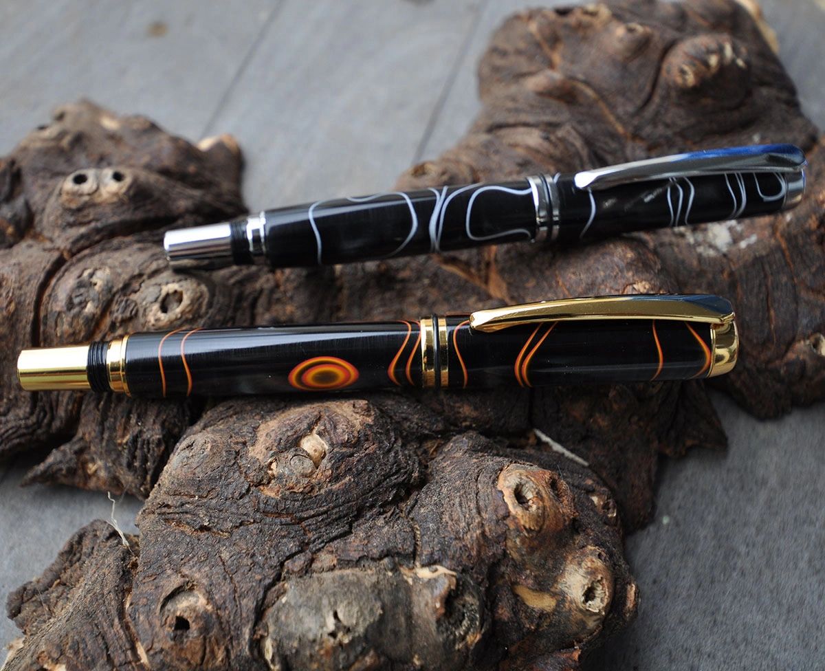 Black pens with intricate designs