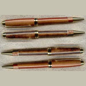 Four elegant wooden pens