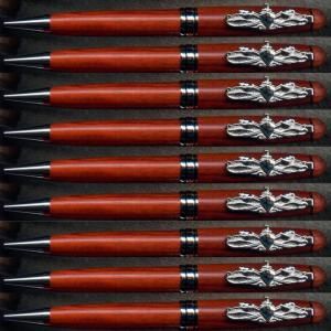 Elegant writing pens aligned neatly