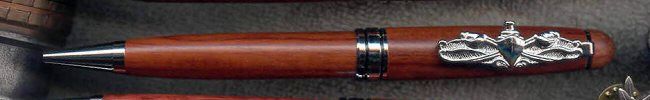 Brown pen featuring intricate silver detailing