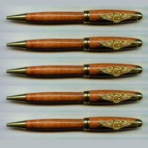 Wooden pens with gold accents