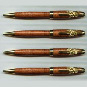 Wooden pens with gold accents