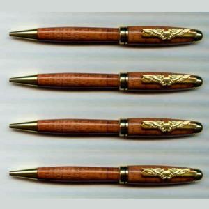 Wooden pens with gold accents