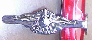 Decorative eagle badge on red object