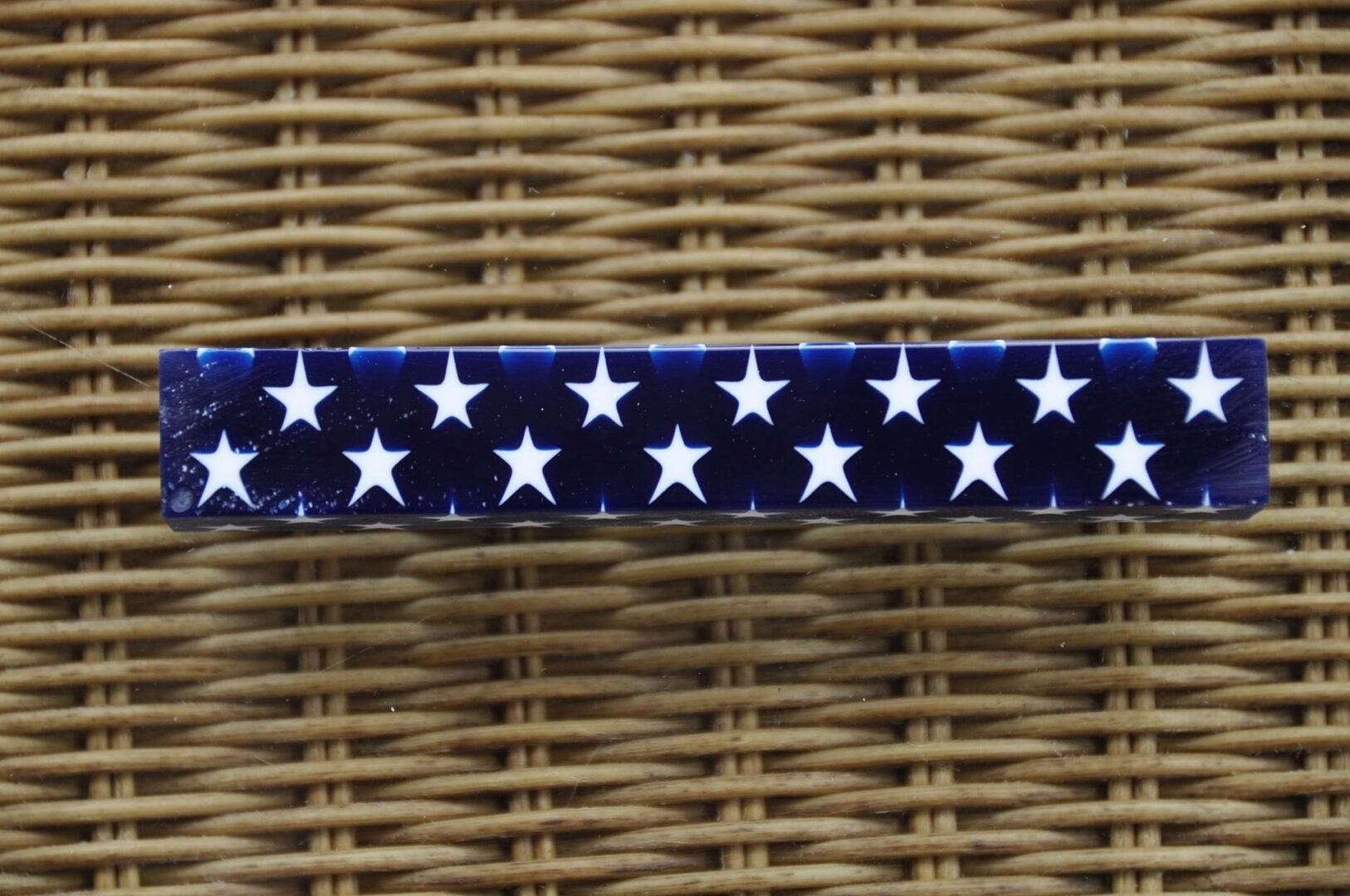 Blue bar with white stars on wicker