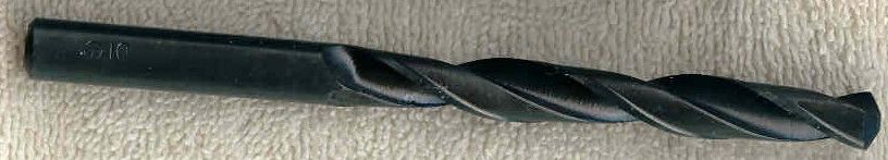 Industrial drill bit with spiral flutes