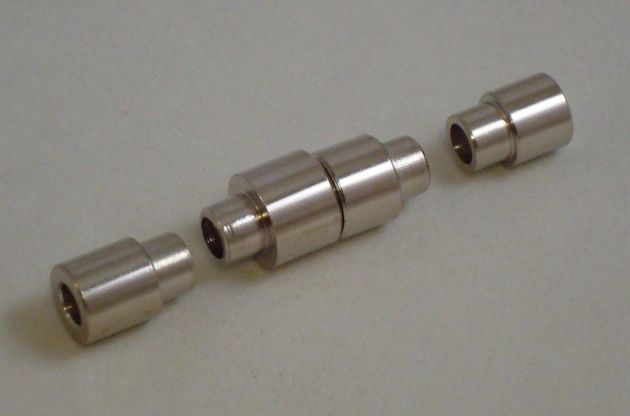 Metal cylindrical connectors on a surface
