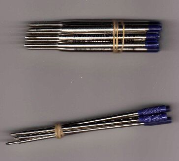 Ballpoint pen refills with blue tips