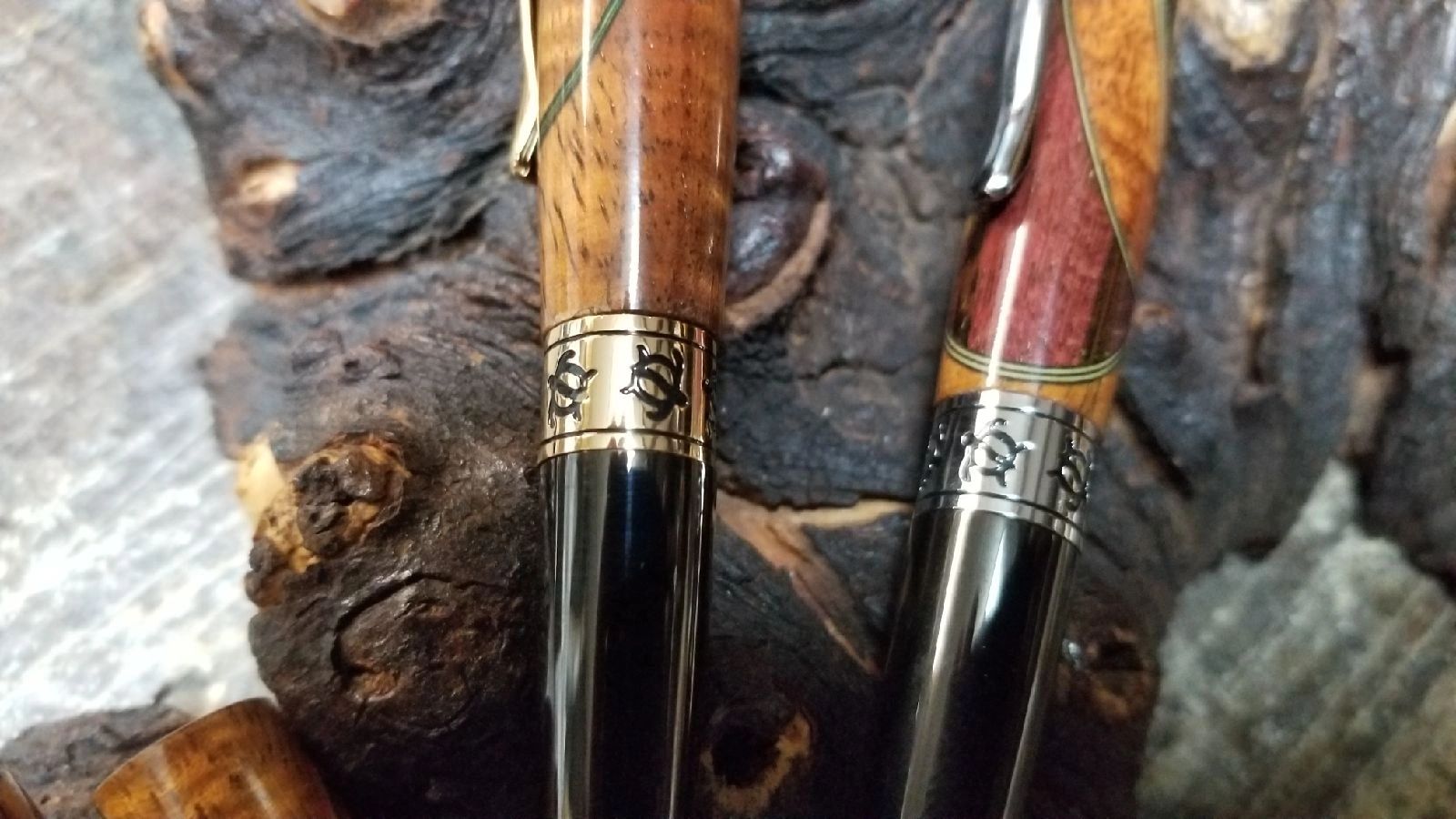 Elegant pens displayed on rustic wood