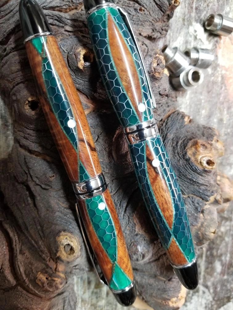 Artistic pens featuring hexagonal patterns