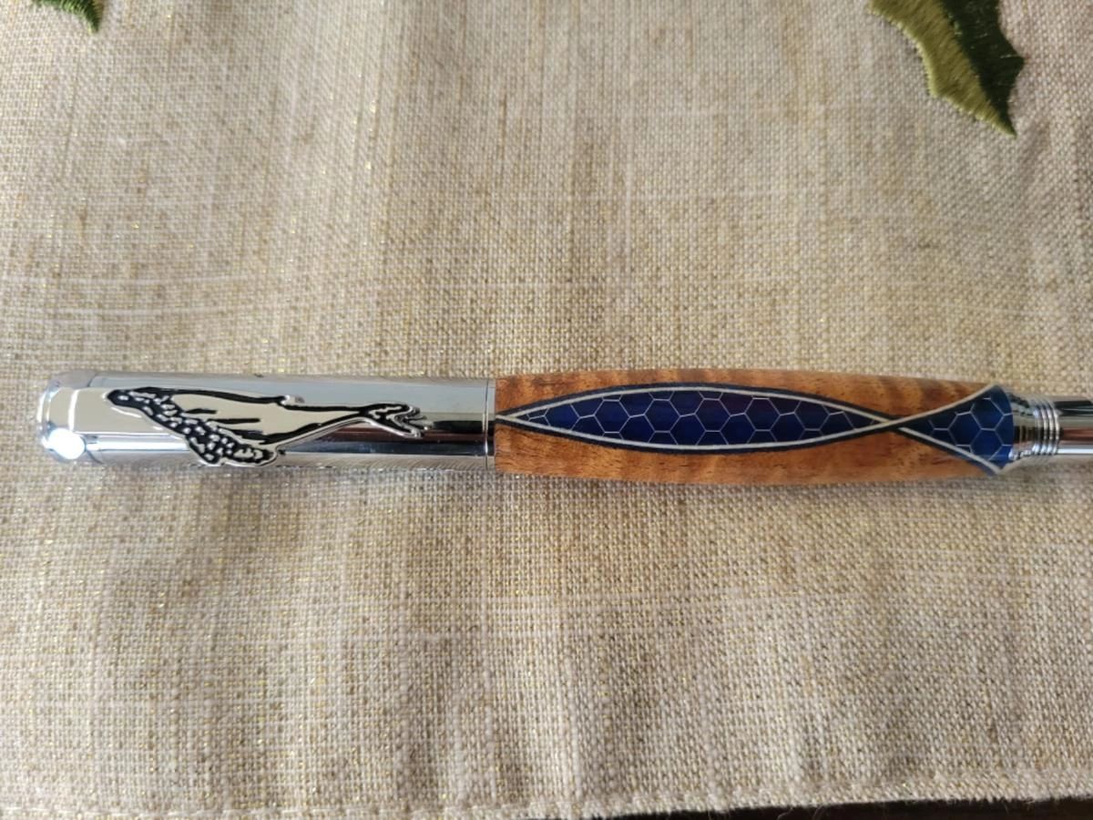 Elegant pen on textured fabric