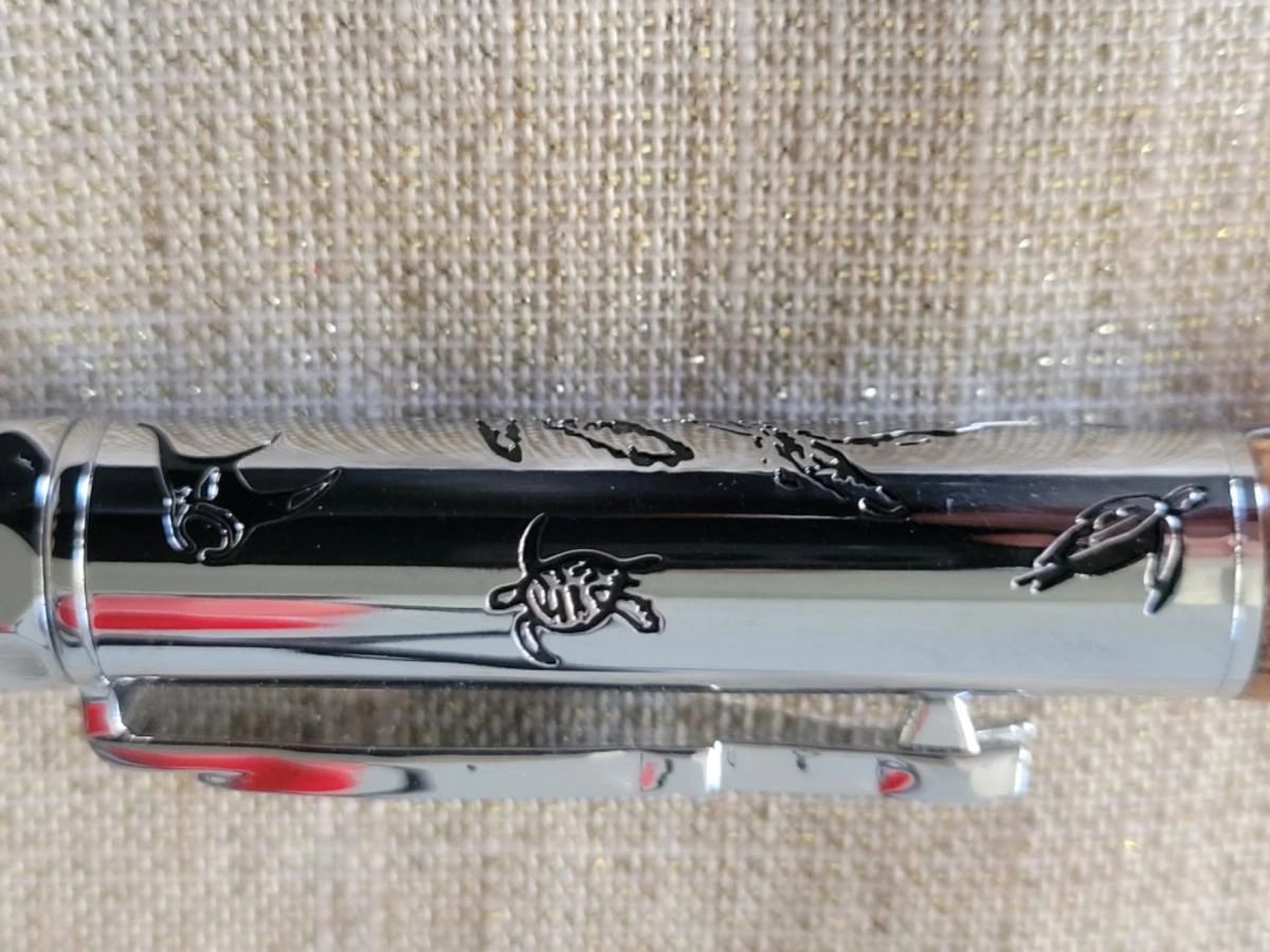 Shiny pen featuring turtle designs