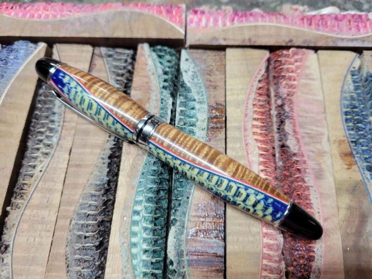 Colorful pen on textured wooden blocks