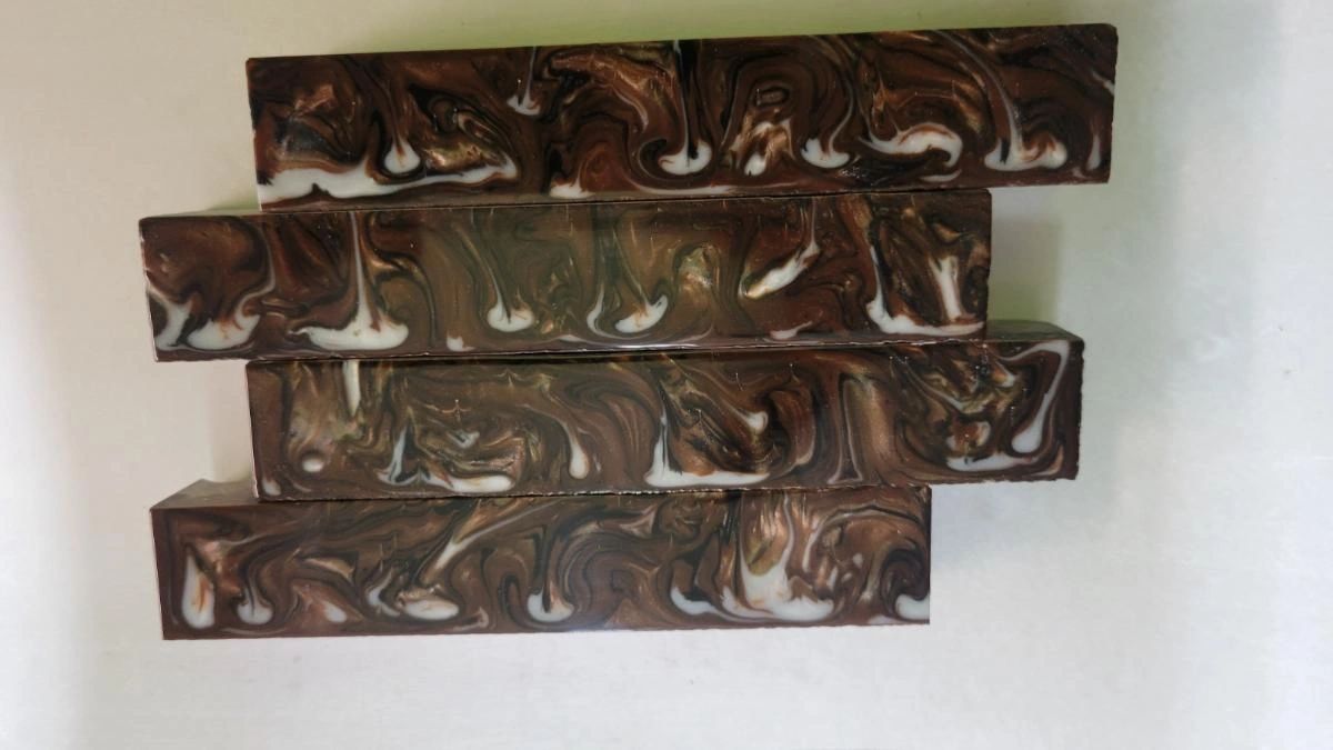 Stacked handmade marbled soap pieces