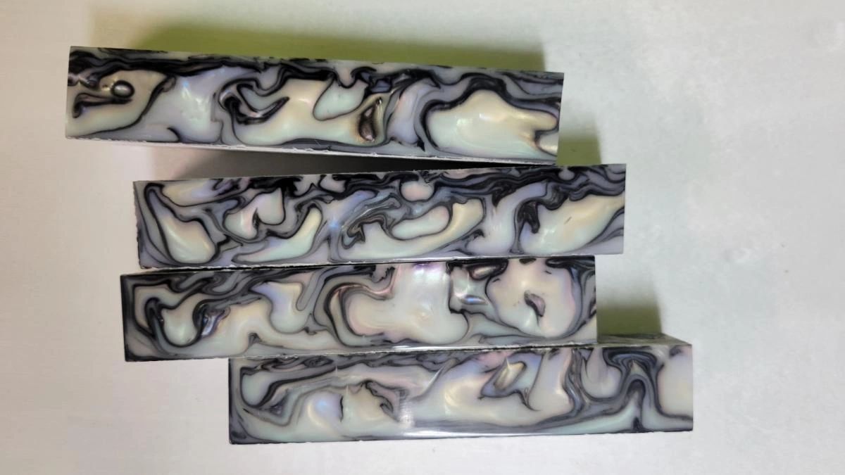 Abstract marbled resin blocks on display