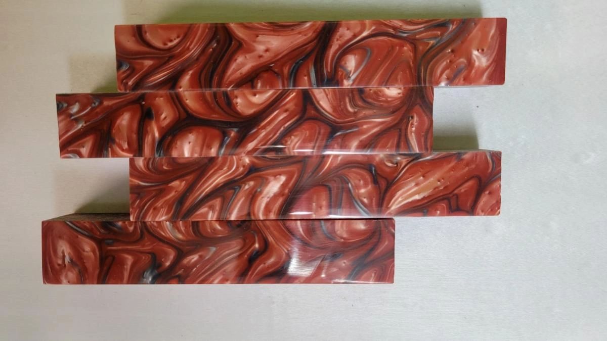 Glossy textured red acrylic pieces