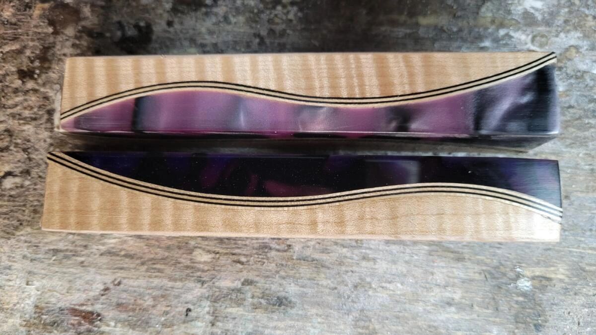 Curved resin inlay in wooden blocks
