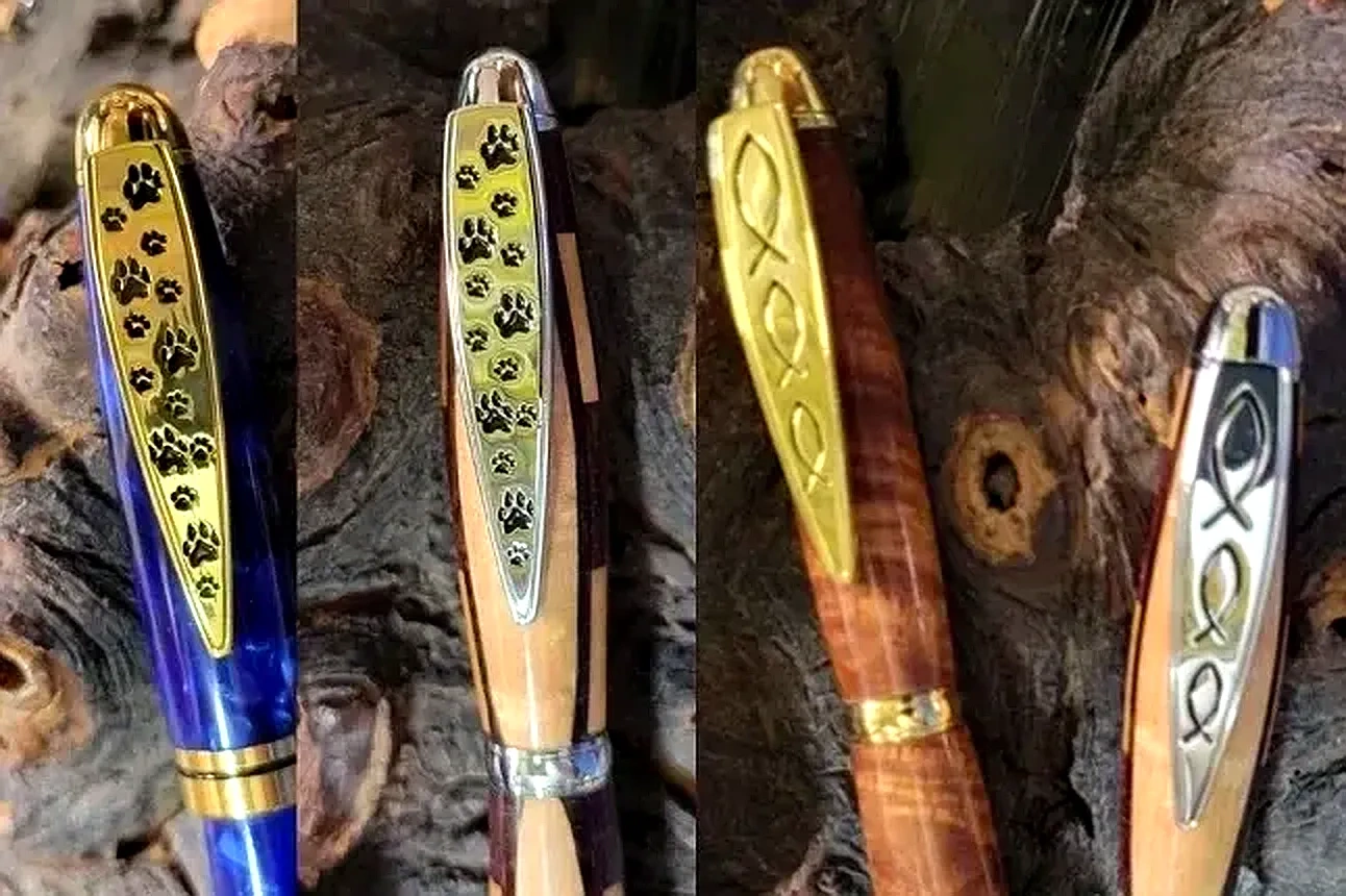 Elegant pens featuring paw and fish symbols